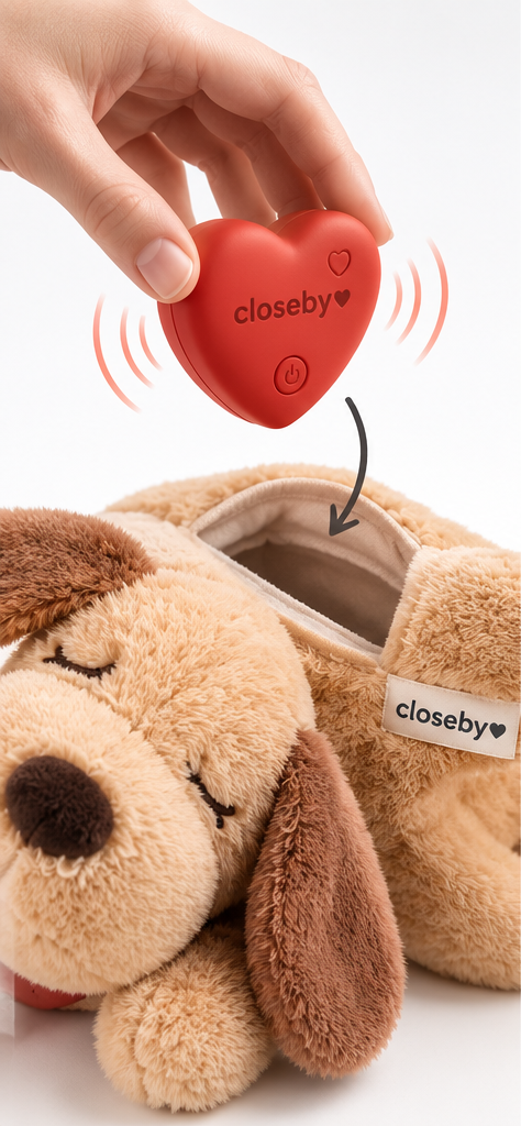 A hand placing the CloseBy heart into the plush